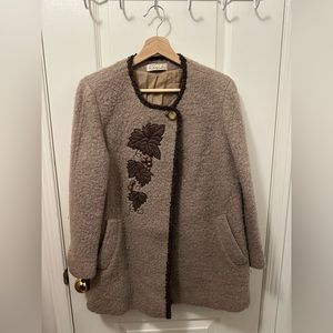 Brown Cape with Seasonal Design. Cute leaves on the front